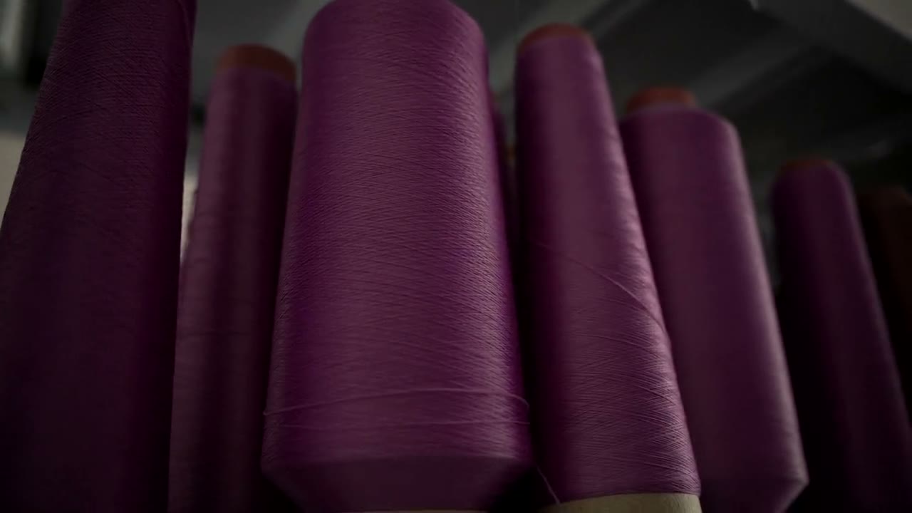 Performance yarns on cones in the Yesseam knitting hall